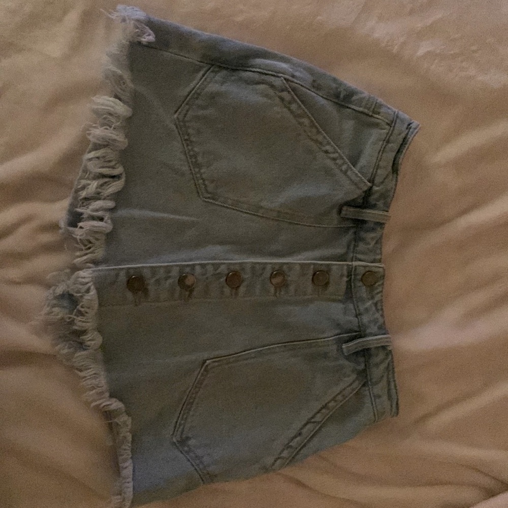 Jean shorts/skirt. You can fully open it.